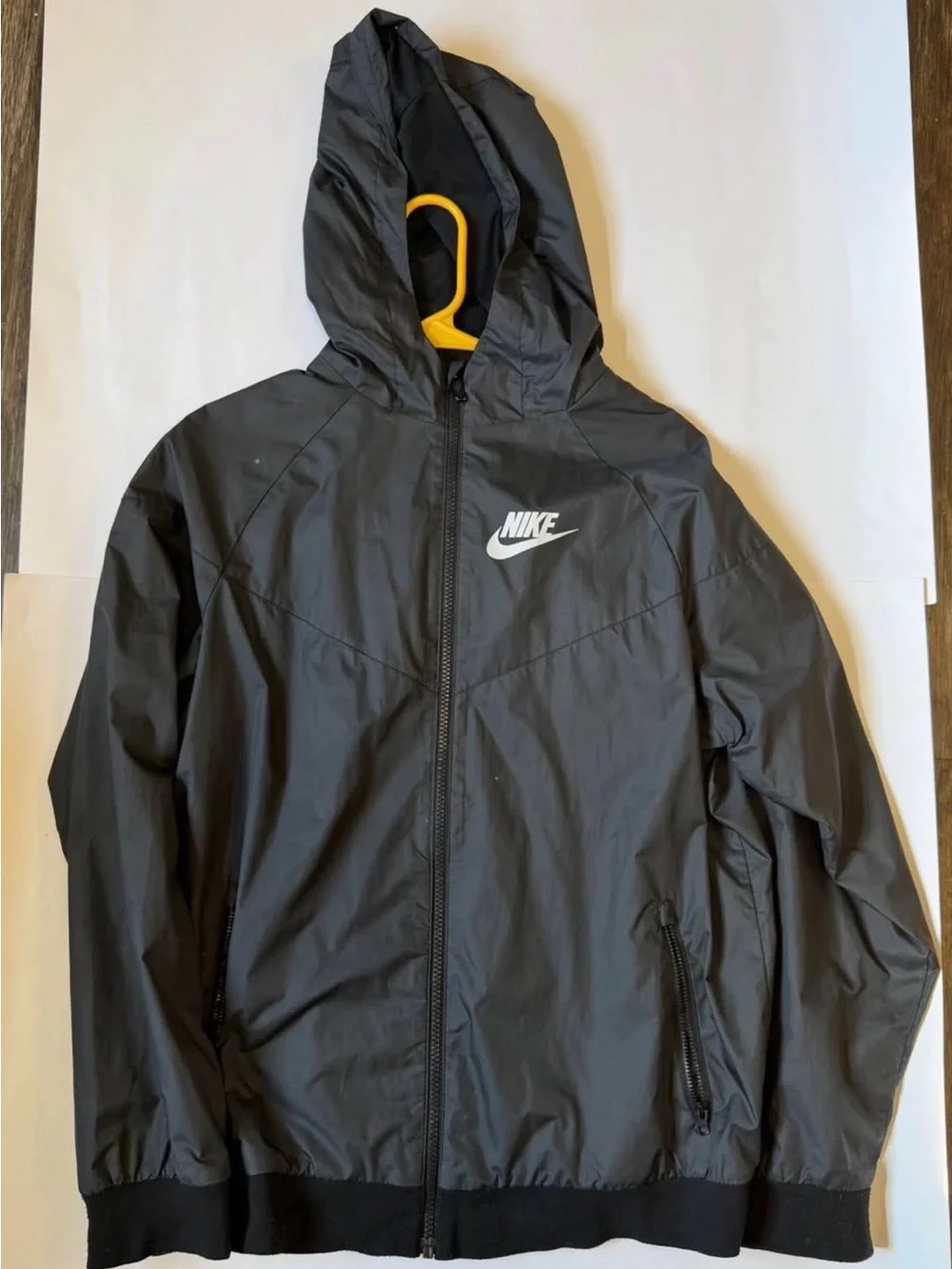 Nike Black Hooded Kids Windbreaker with White Logo Accent